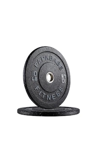 a black weight plate on top of a white background